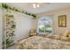 Bedroom with closet, decorative shelving, and two twin beds with floral bedding at 4149 Salernes Ave # 3048, Sarasota, FL 34233