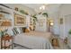 Comfortable bedroom with a large bed, built-in shelves, and a view of the en-suite bathroom at 4149 Salernes Ave # 3048, Sarasota, FL 34233
