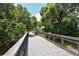 Picturesque community bridge surrounded by lush greenery and providing a scenic walkway for residents at 4149 Salernes Ave # 3048, Sarasota, FL 34233