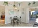 Quaint breakfast nook with a view, blending indoor and outdoor living seamlessly at 4149 Salernes Ave # 3048, Sarasota, FL 34233