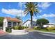 Welcoming community entrance with lush landscaping and a security checkpoint for added peace of mind at 4149 Salernes Ave # 3048, Sarasota, FL 34233