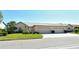 Attractive single-story home with well-kept lawn and landscaping, complete with an attached two-car garage at 4149 Salernes Ave # 3048, Sarasota, FL 34233
