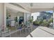 Charming screened lanai provides a relaxing space with views of the landscaped backyard at 4149 Salernes Ave # 3048, Sarasota, FL 34233