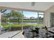 Enclosed patio offering peaceful pond views, perfect for enjoying outdoor dining or relaxation in a serene setting at 4149 Salernes Ave # 3048, Sarasota, FL 34233