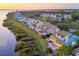 Stunning waterfront community with beautifully maintained homes and lush landscaping at 44 Tidy Island Blvd, Bradenton, FL 34210