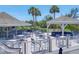 Community deck featuring outdoor dining area with seating and grilling stations at 44 Tidy Island Blvd, Bradenton, FL 34210