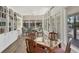 Bright dining area with natural light, wood floors, and seating at 44 Tidy Island Blvd, Bradenton, FL 34210
