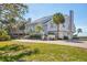Beautiful home with a brick driveway, manicured landscaping, and classic architectural details at 44 Tidy Island Blvd, Bradenton, FL 34210