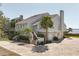 Beautiful home with a brick driveway, manicured landscaping, and classic architectural details at 44 Tidy Island Blvd, Bradenton, FL 34210