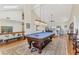 Open concept living area with a pool table and views at 44 Tidy Island Blvd, Bradenton, FL 34210