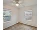 Bedroom features a ceiling fan and windows that provide natural light at 452 Patterson Ave, Osprey, FL 34229