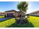 Charming home with a well-manicured lawn and lovely landscaping, enhancing its curb appeal at 4617 Alexandria Ct, Palmetto, FL 34221