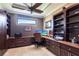Functional office space equipped with custom built-ins, offering ample storage and workspace at 4617 Alexandria Ct, Palmetto, FL 34221