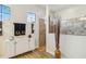 Modern bathroom features a glass shower, decorative accents and plenty of natural light at 4856 Coastal Days Ln, Bradenton, FL 34211