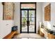 Welcoming entryway featuring a stylish front door and bright interior at 49 Osprey Point Dr, Osprey, FL 34229