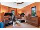 Home gym with treadmills, elliptical machine, and natural lighting at 49 Osprey Point Dr, Osprey, FL 34229