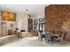Bright living room with high ceilings, fireplace, and comfortable seating areas at 49 Osprey Point Dr, Osprey, FL 34229