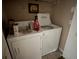 A functional laundry area with a washer and dryer set for convenient chores at 5560 Rosehill Rd # 105, Sarasota, FL 34233