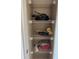 Pantry closet with storage shelving at 5560 Rosehill Rd # 105, Sarasota, FL 34233