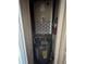 A utility closet with water heater, HVAC, and a fire extinguisher at 5560 Rosehill Rd # 105, Sarasota, FL 34233