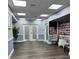 Welcoming lobby featuring light blue walls, elegant flooring, and comfortable seating at 5791 Holiday Park Blvd, North Port, FL 34287