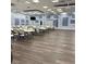 Spacious meeting room with hardwood floors, ample seating, and modern amenities for community gatherings at 5791 Holiday Park Blvd, North Port, FL 34287