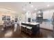 Bright kitchen boasts a large island with seating, stainless steel appliances, and a dining area at 581 Mast Dr, Bradenton, FL 34208