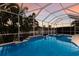 This screened-in pool area is perfect for relaxing and entertaining. Enjoy a swim any time of year! at 581 Mast Dr, Bradenton, FL 34208