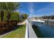 Waterfront property with a private boat lift and stunning views of the canal, perfect for boating enthusiasts at 581 Mast Dr, Bradenton, FL 34208