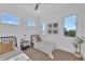 Bright bedroom featuring twin beds, modern décor and ample natural light at 603 Tremont St, Sarasota, FL 34242