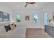 Bright bedroom with windows offering natural light, ceiling fan and modern dresser at 603 Tremont St, Sarasota, FL 34242