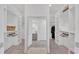 Spacious walk-in closet with custom shelving, drawers, and full length mirror at 603 Tremont St, Sarasota, FL 34242
