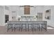 Bright kitchen features an oversized island with seating, modern cabinets and stainless steel appliances at 603 Tremont St, Sarasota, FL 34242