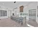 Modern, open-concept kitchen with a large island, stainless steel appliances, and sleek cabinetry at 603 Tremont St, Sarasota, FL 34242