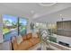 Open living area boasts modern railing, sleek finishes and a view of lush landscaping at 603 Tremont St, Sarasota, FL 34242