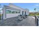Expansive rooftop deck offering stylish seating and panoramic views of the surrounding landscape at 603 Tremont St, Sarasota, FL 34242