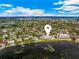 Aerial view of the condos location on the bay, surrounded by lush landscaping and beautiful scenery at 6430 Sun Eagle Ln # 103, Bradenton, FL 34210
