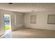 Spacious living area with natural light and an open layout, ready for personalization at 704 Chippy Ln, Nokomis, FL 34275