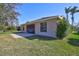 Well-maintained backyard with a screened lanai and lovely landscaping at 7214 35Th E Ln, Sarasota, FL 34243
