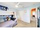 Bright bedroom featuring a bunk bed, closet, and light blue walls, great for  at 7214 35Th E Ln, Sarasota, FL 34243
