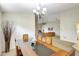 Formal dining room with modern décor, with an open view to the living room at 7214 35Th E Ln, Sarasota, FL 34243