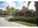 Charming community entrance with pedestrian gate, and accessible parking awaits at this well-maintained building at 7887 Limestone Ln # 12-102, Sarasota, FL 34233