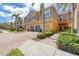 Charming townhome with lush landscaping, paver driveway, and attached garages at 7887 Limestone Ln # 12-102, Sarasota, FL 34233