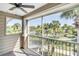 Relaxing screened patio with scenic views, and a ceiling fan at 8926 Manor Loop # 206, Lakewood Ranch, FL 34202