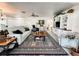 Bright living room featuring a cozy seating area, built-in shelving, and an inviting atmosphere at 916 W Faith Cir, Bradenton, FL 34212
