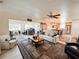 Spacious living room with an open floor plan, seamlessly connecting the kitchen and office at 916 W Faith Cir, Bradenton, FL 34212