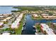 Aerial view of attached villas with canal access and boat lifts at 9527 Azure Cv, Bradenton, FL 34210