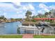 View of boat on lift with canal access at 9527 Azure Cv, Bradenton, FL 34210