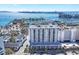 A scenic aerial view of the condo building with a view of the bay and city skyline at 101 S Gulfstream Ave # 14G, Sarasota, FL 34236