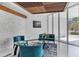 A bright sitting area in the lobby, featuring comfortable furniture and a view of the outdoors through large windows at 101 S Gulfstream Ave # 14G, Sarasota, FL 34236